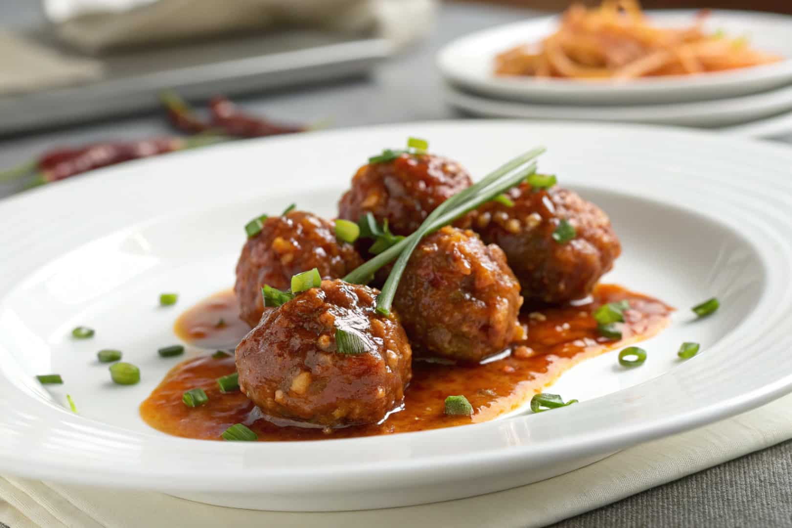sweet chili meatballs crockpot featured dish plated