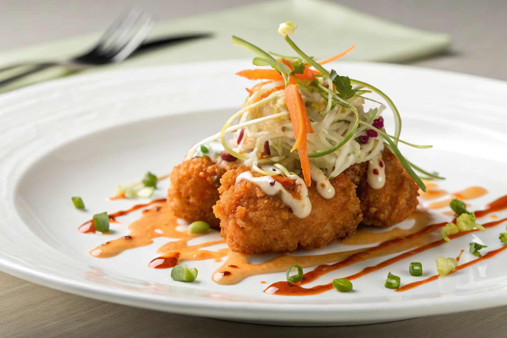 crispy bang bang chicken appetizer featured dish plated