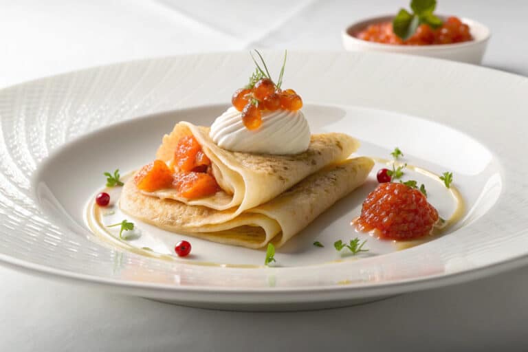 russian blini pancakes recipe featured dish plated