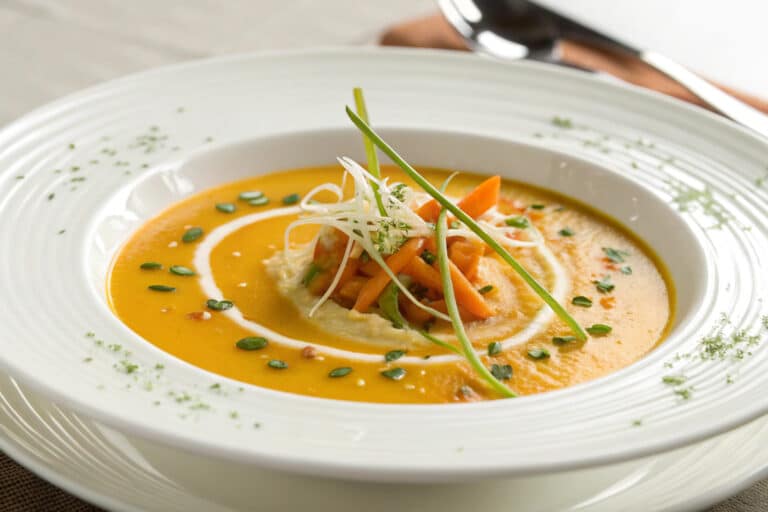 potato leek carrot soup featured dish plated